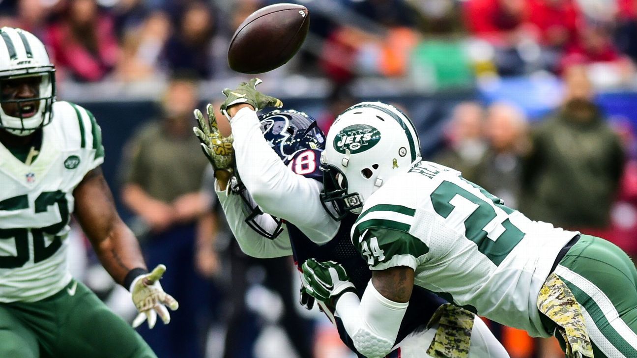 Jets' Revis suffers concussion; Mangold also hurt