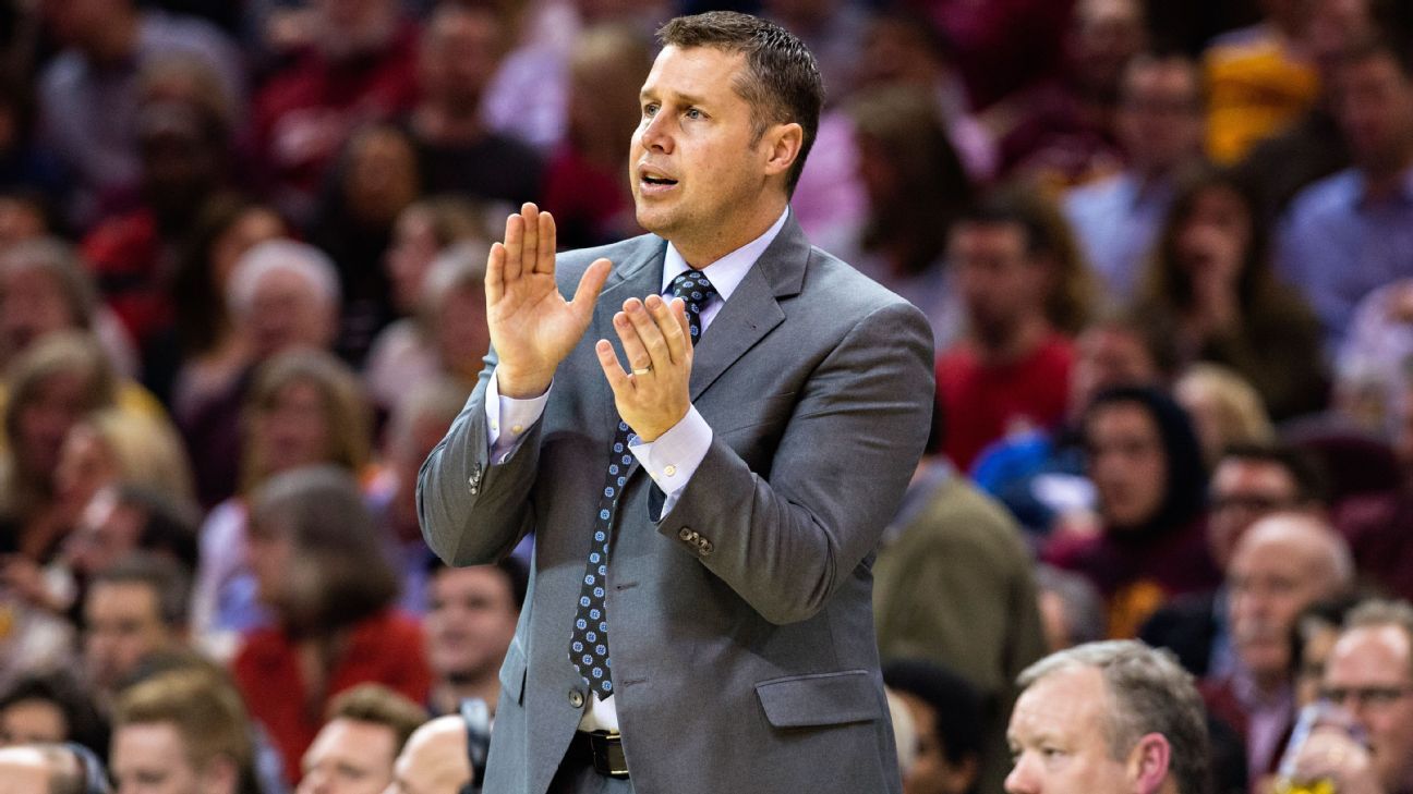 Dave Joerger of Sacramento Kings exits after falling to knee