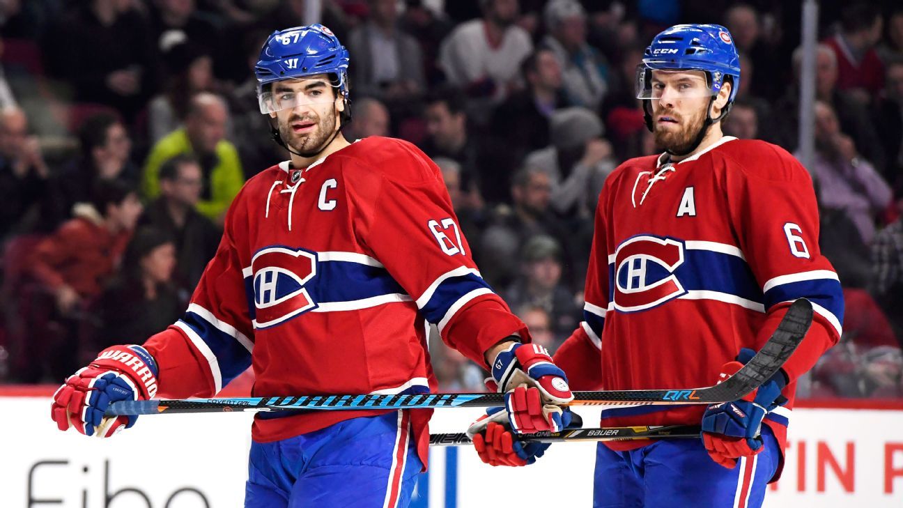 Montreal Canadiens captain Max Pacioretty helped off ice after getting hit by puck