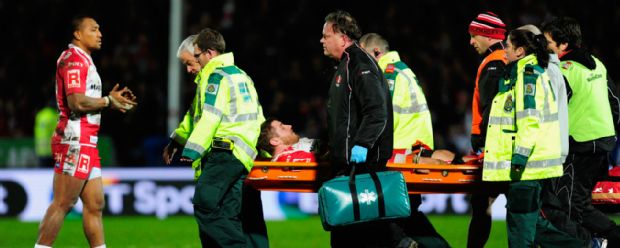 Gloucester's Ben Morgan is stretchered off with a fractured ankle during the Aviva Premieship clash with Saracens