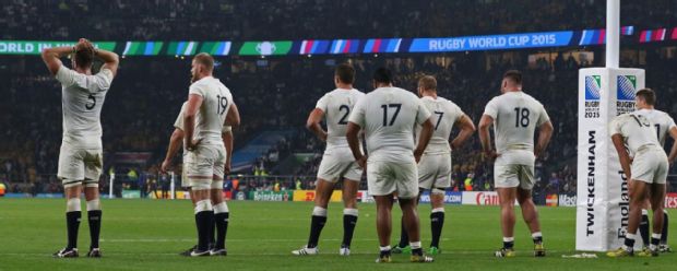 England players react after losing the 2015 Rugby World Cup Pool A match between England and Australia