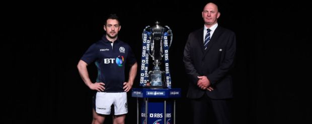 Greig Laidlaw, captain of Scotland and head coach Vern Cotter pose with the trophy during the RBS Six Nations launch