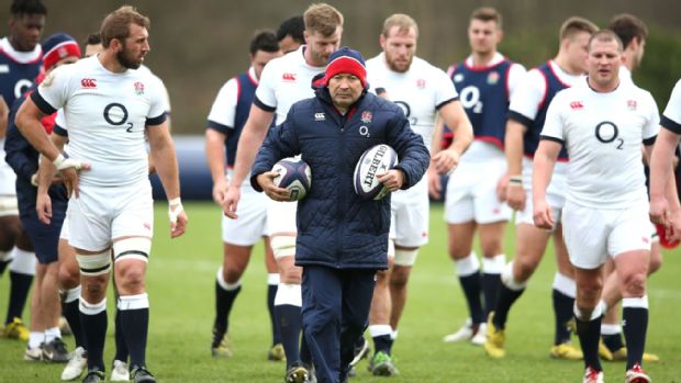 Eddie Jones leads the England players out for training
