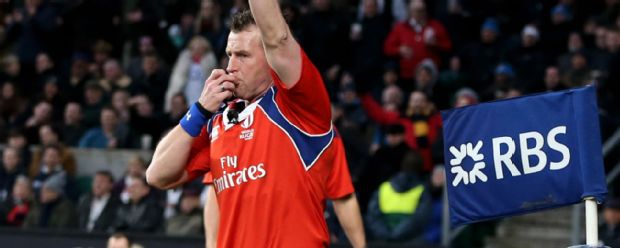 Referee Nigel Owens calls for a try