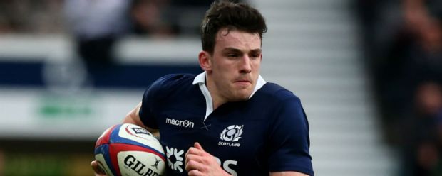 Scotland's Matt Scott runs with the ball