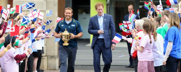Jonny Wilkinson and Prince Harry walk the Rugby World Cup out of Twickenham