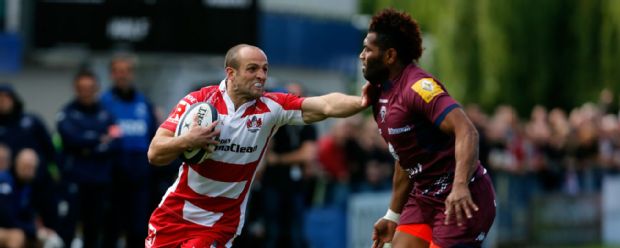 Charlie Sharples of Gloucester runs with the ball