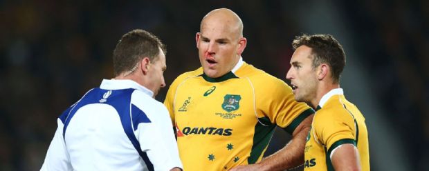 Stephen Moore chats to referee Nigel Owens during the defeat to New Zealand in the Bledisloe Cup.