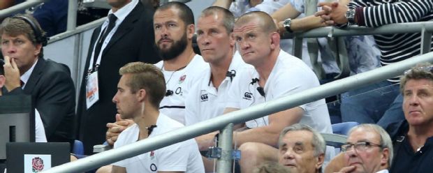 The England coaching team watch on during the defeat to France