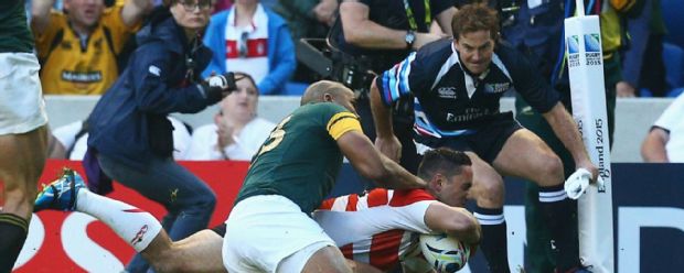 Karne Hesketh scores the match-winning try for Japan against South Africa