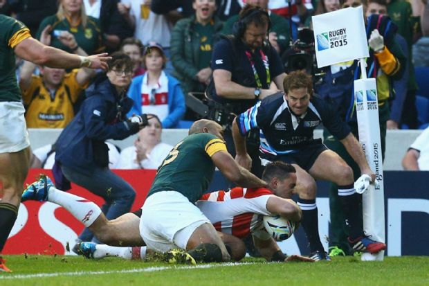 Karne Hesketh scores the match-winning try for Japan against South Africa