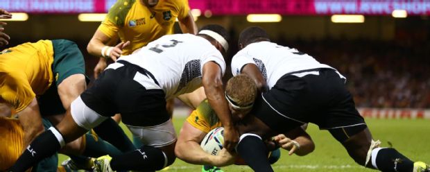 David Pocock scores the opening try for Australia against Fiji