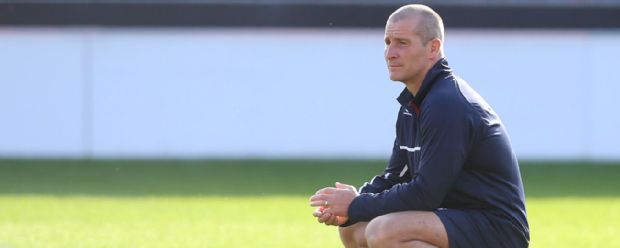 Stuart Lancaster looks on during England training