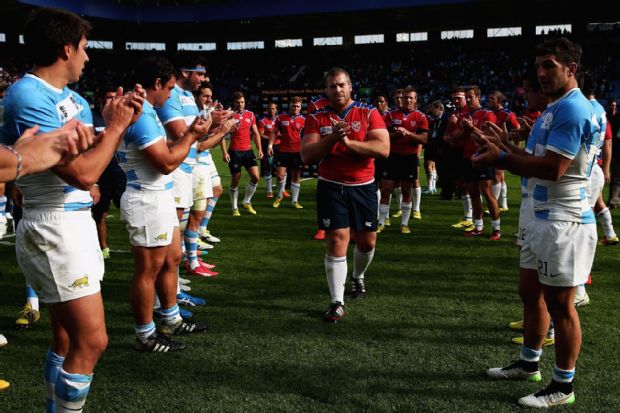 Johnny Redelinghuys leads Namibia off the pitch