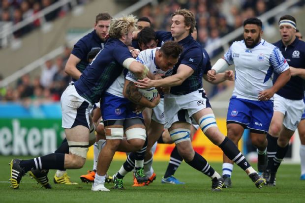 Jack Lam is tackled by Richie Gray and Jonny Gray