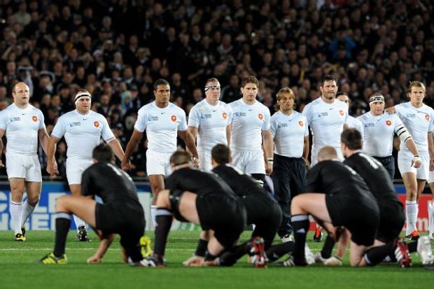 The French team advance to receive the challenge of the New Zealand All Black Haka