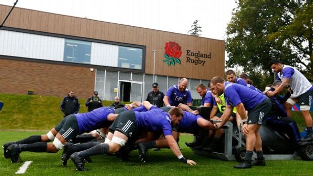 The All Blacks practice their scrum