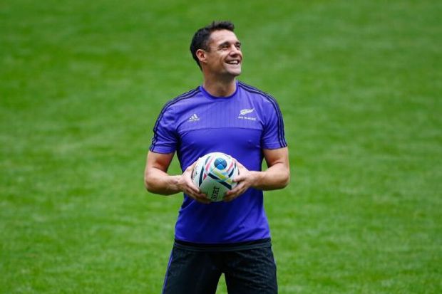 Dan Carter smiles during New Zealand's captain's run ahead of the Rugby World Cup final