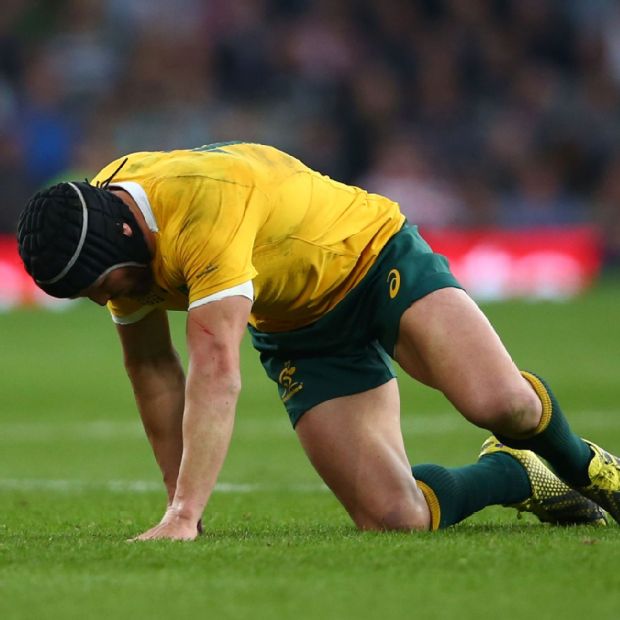 Matt Giteau tries to get up following an injury