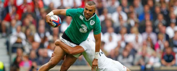 Simon Zebo is tackled by Jonathan Joseph