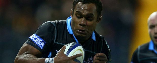 Leone Nakarawa of Glasgow Warriors is tackled by Henry Chavancy of Racing 92