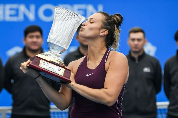 Aryna Sabalenka of Belarus poses with her trophy after winning the women's singles final match in the Shenzhen Open