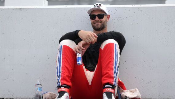 Shane van Gisbergen showing his cooling shirt