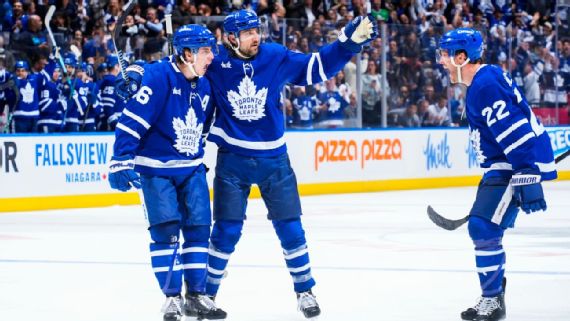 Mitch Marner and Chris Tanev