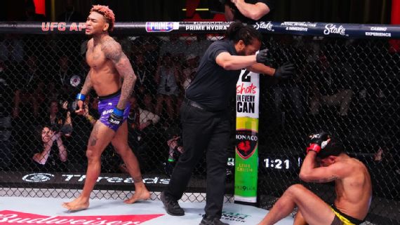 Michael Morales celebrates his TKO victory over Gilbert Burns