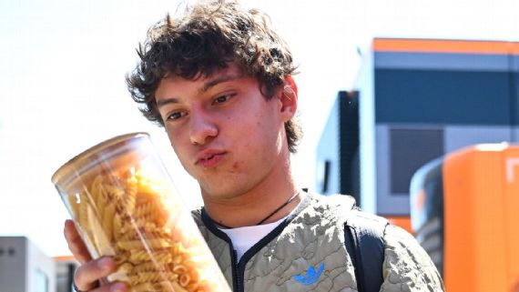 Andrea Kimi Antonelli receiving pasta