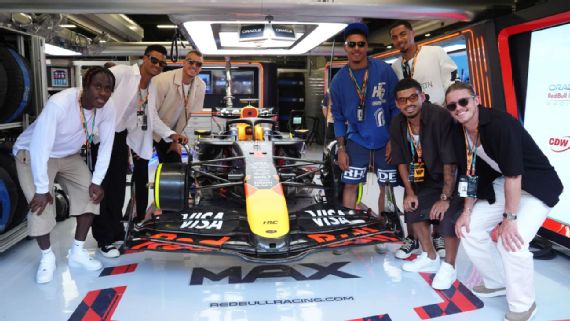 England's players in the Red Bull Racing garage.