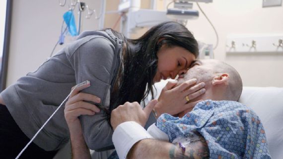 Scot Pollard saying goodbye to his wife before surgery