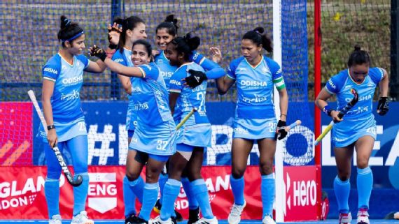 Indian team strategizing during a timeout