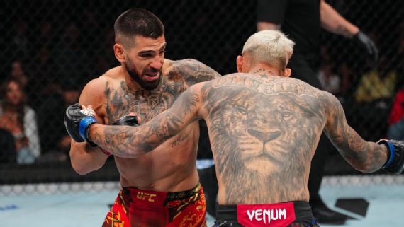 Ilia Topuria celebrates his stunning first-round knockout victory over Charles Oliveira.