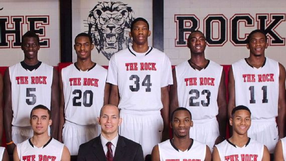 Joel Embiid playing basketball for The Rock School