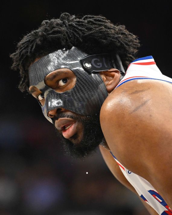 Joel Embiid reacting during a basketball game