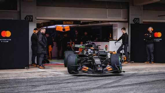Lando Norris comes out of the garage in Barcelona with the No.1