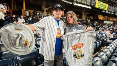 New York Yankees fans bring inflatable trash cans, costumes and