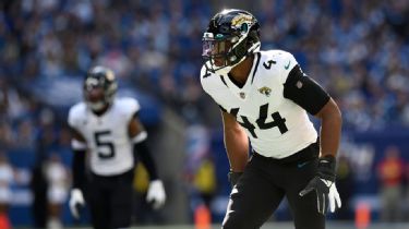 Jacksonville Jaguars linebacker Travon Walker (44) walks the sideline  during the second half of an NFL football game against the Baltimore  Ravens, Sunday, Nov. 27, 2022, in Jacksonville, Fla. The Jacksonville  Jaguars