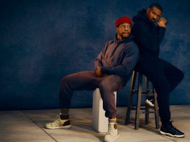 Jonathan Majors, left, and Michael B. Jordan arrive at the Vanity