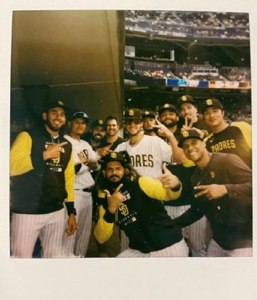 Josh Hader of the San Diego Padres signs autographs for fans