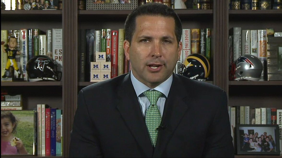 Adam Schefter spotted at Liberty National (rocking dual cell