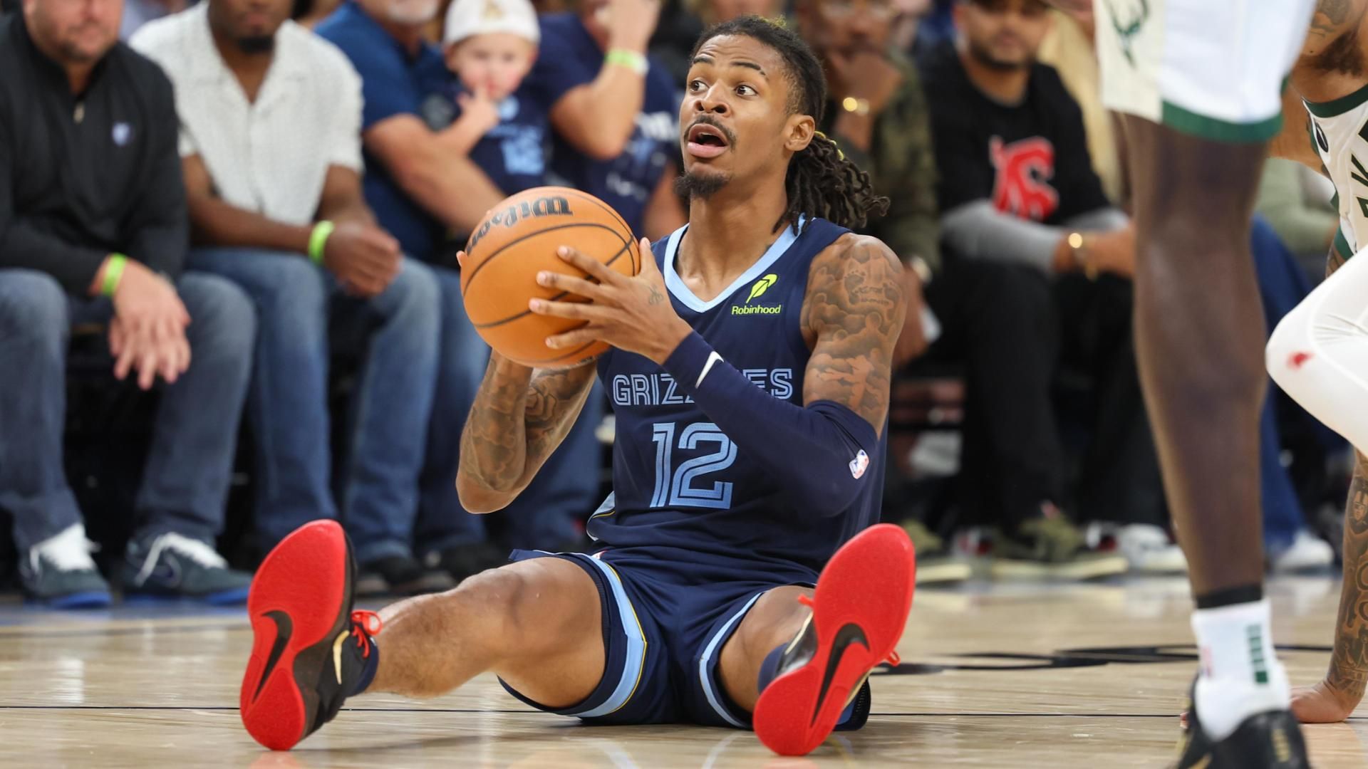 Ja Morant throws up alleyoop while sitting down ESPN Video