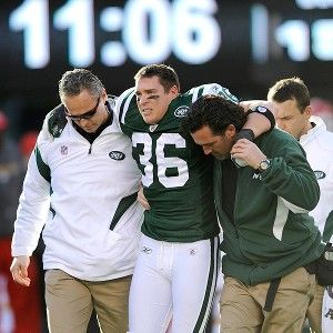 New York Jets Jim Leonhard reacts in pain after getting injured making an  interception in the second quarter against the Kansas City Chiefs in week  14 of the NFL season at MetLife