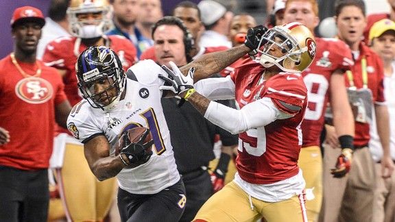 Photo: Ravens Todd Heap gains 4 yards against the Denver Broncos