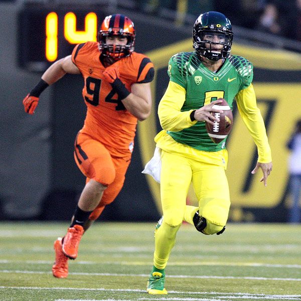 Oregon's Marcus Mariota, Hroniss Grasu announce they will return