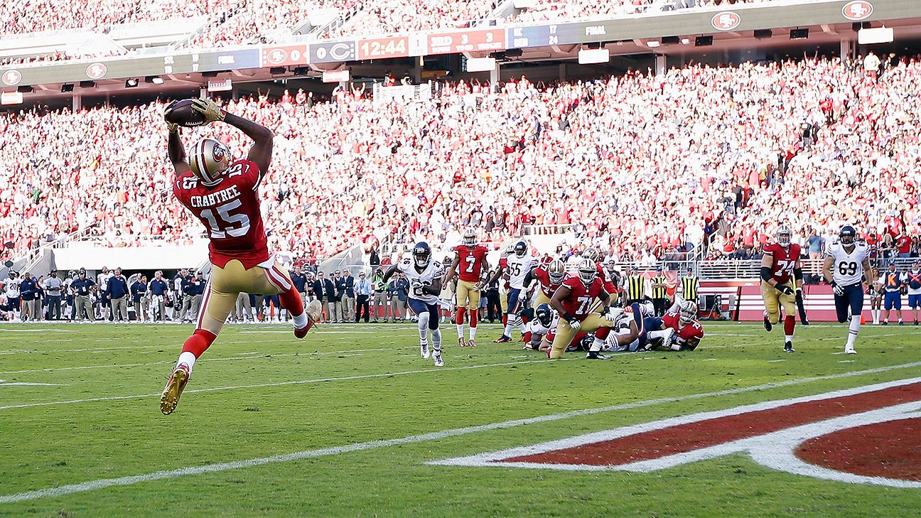 San Francisco 49ers Michael Crabtree (15) is pursued by New