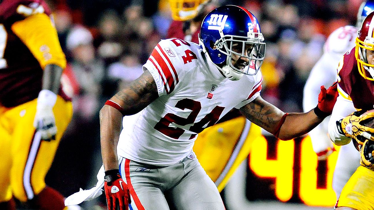 New York Giants cornerback Terrell Thomas (24) pushes Tennessee