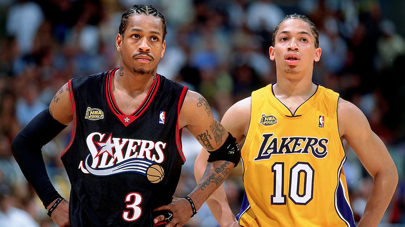 Tyronn Lue poses w/ fan wearing a shirt of Allen Iverson stepping over him.  : r/lakers