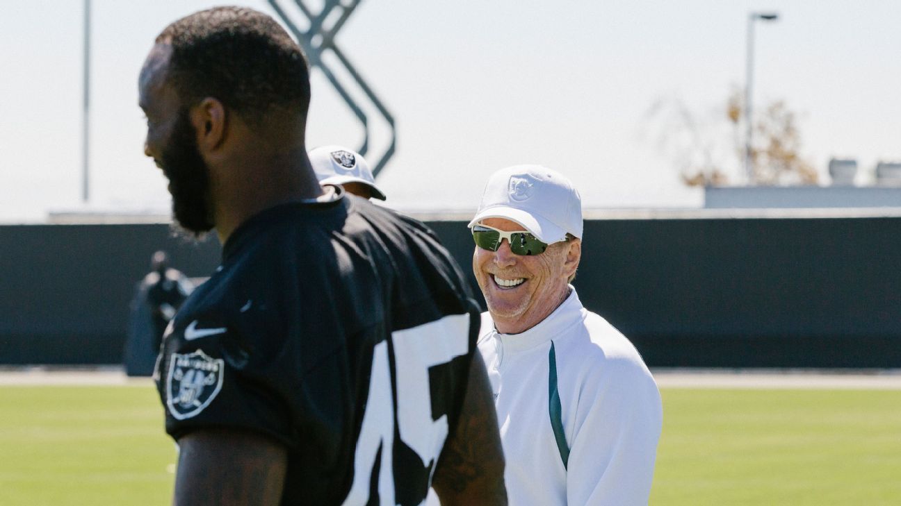 Carson councilman with split Chargers/Raiders jersey (Photo)